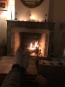 Relaxing toes by the fireplace